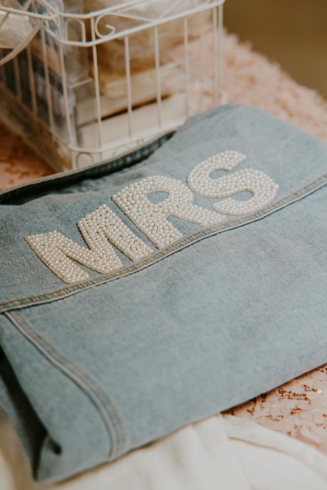 denim jacket with "Mrs." in beads